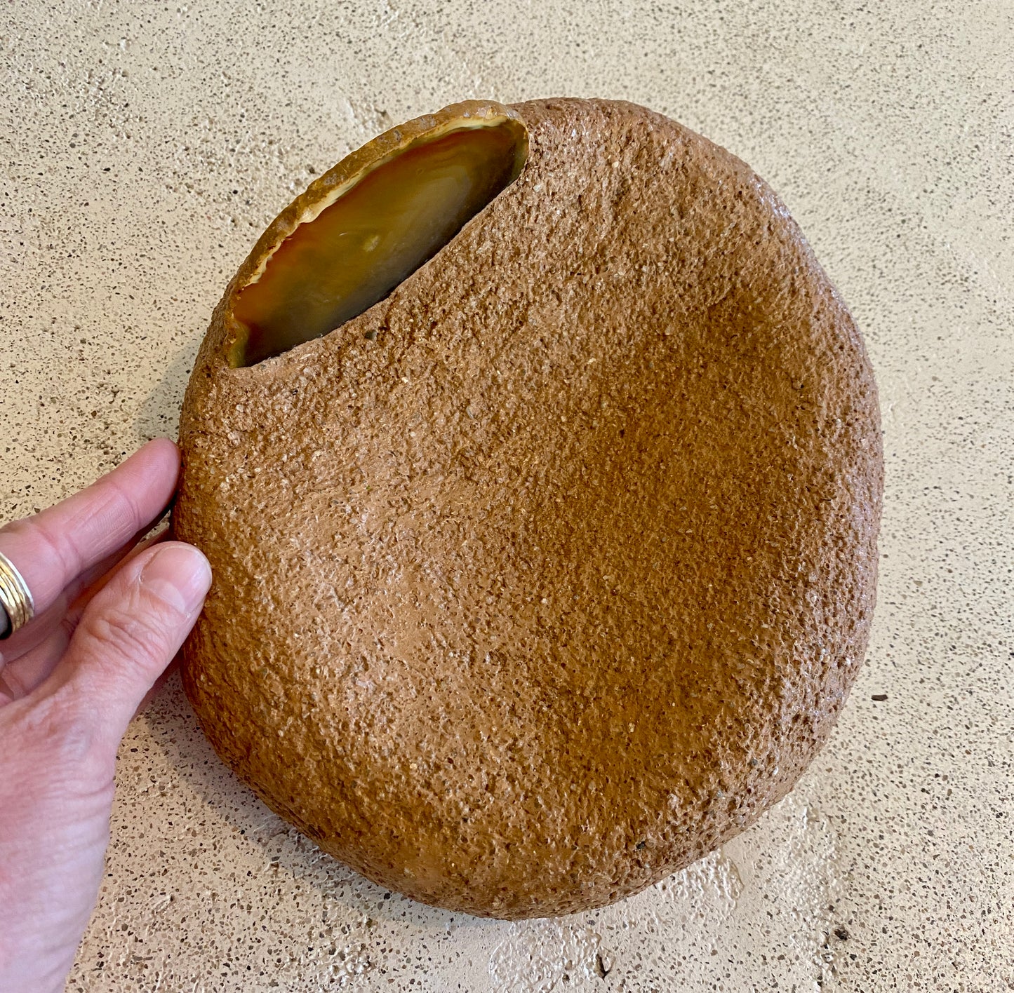 R. Bisk adobe stony vessel with agate